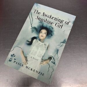 The Awakening of Sunshine Girl by: Paige McKenzie, paperback book